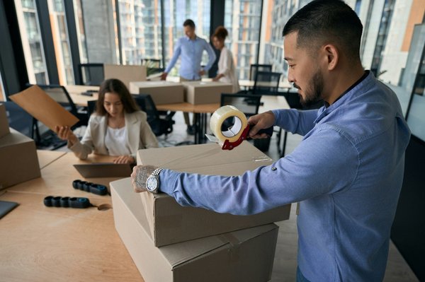 What are the key steps for relocating a home aquarium with marine life in the UK?